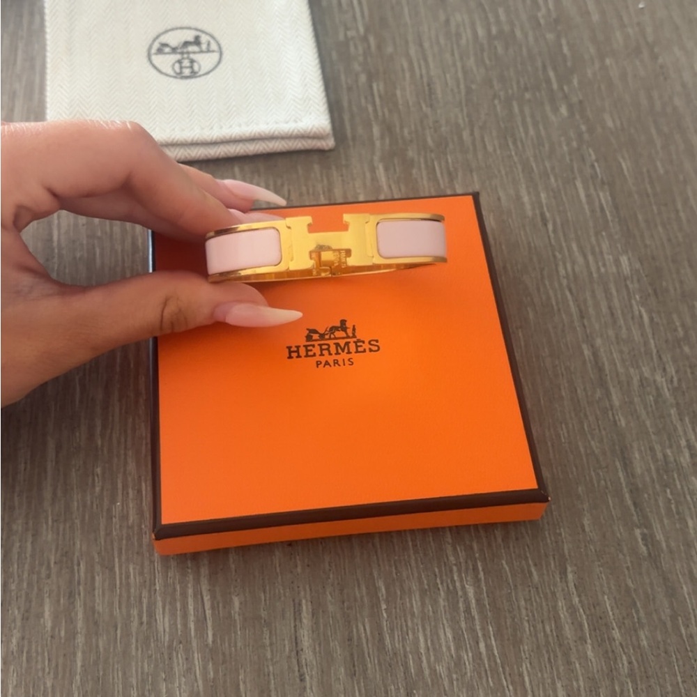 Hermès Pink and Gold Clic H Bracelet